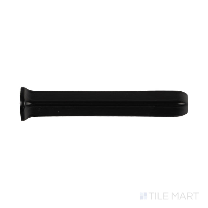 Close-up of black sanitary cove base 1x6 outside corner matte ceramic trim showing molded exterior angle