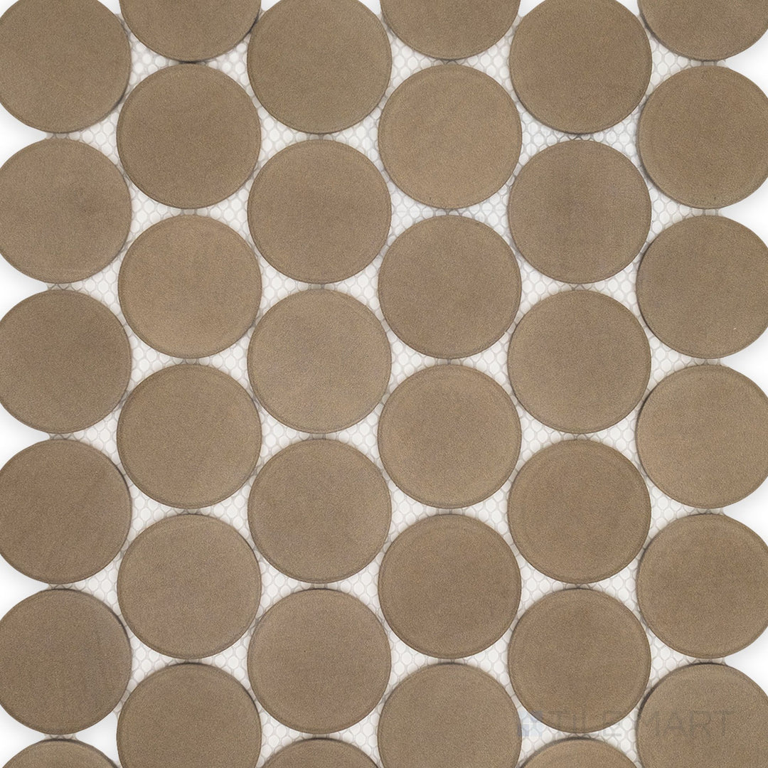 Capturing the sleek circular design and muted gray tones, this overview of the Amuri Grigio 2-Inch Round Matte Porcelain Mosaic Tile showcases its clean pattern and soft matte texture.