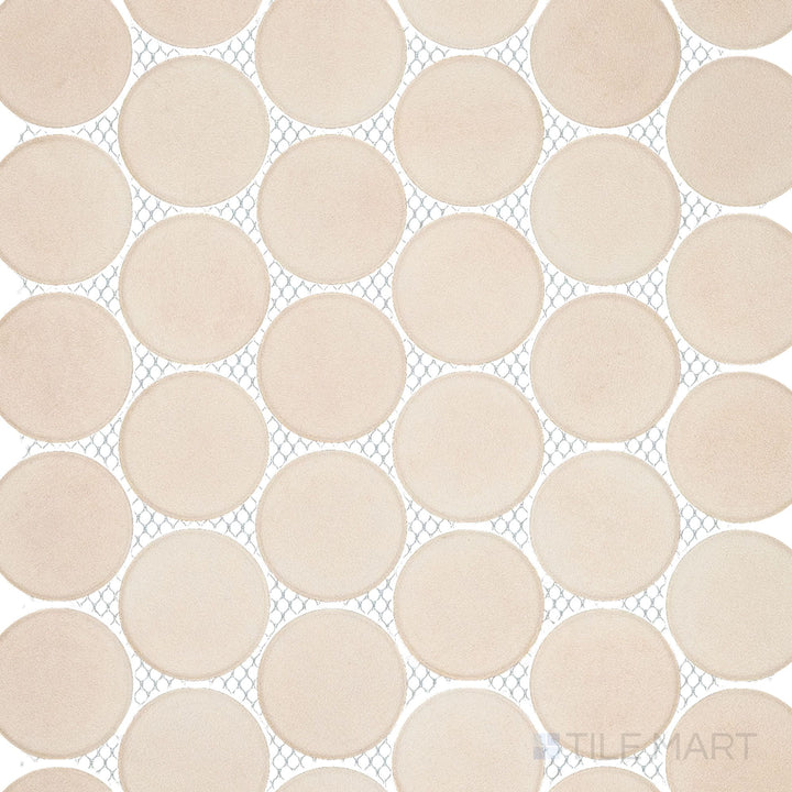 Amuri Avorio 2-Inch Round Matte Porcelain Mosaic Tile is shown in an overview capturing its soft ivory tone, smooth matte surface, and clean circular layout ideal for timeless interiors.