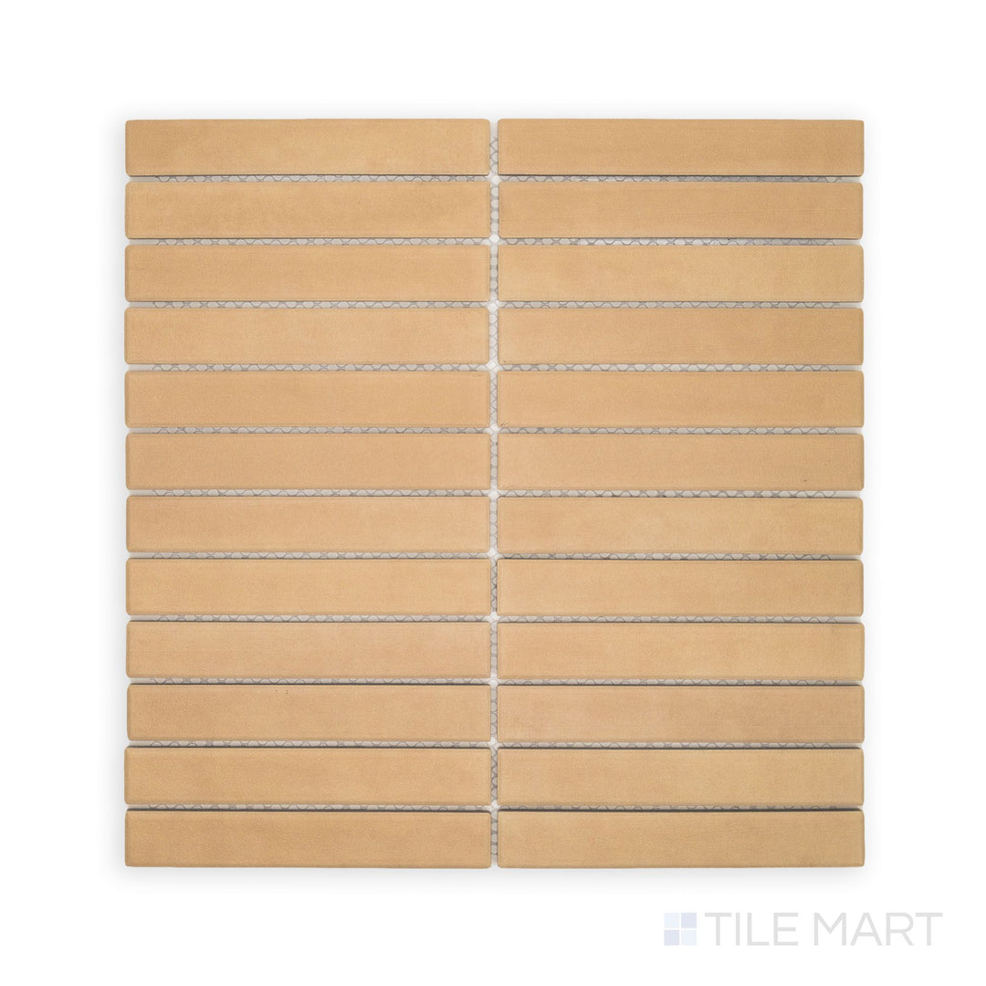 Flat lay of Amuri Biscotto 1x6 Grid Matte Porcelain Mosaic Tile featuring warm biscuit-colored rectangular tiles aligned in a clean, linear grid.