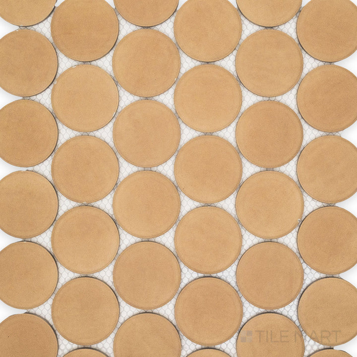 This overview highlights the Amuri Biscotto 2-Inch Round Matte Porcelain Mosaic Tile with its neutral tones, circular layout, and refined matte texture perfect for understated style.