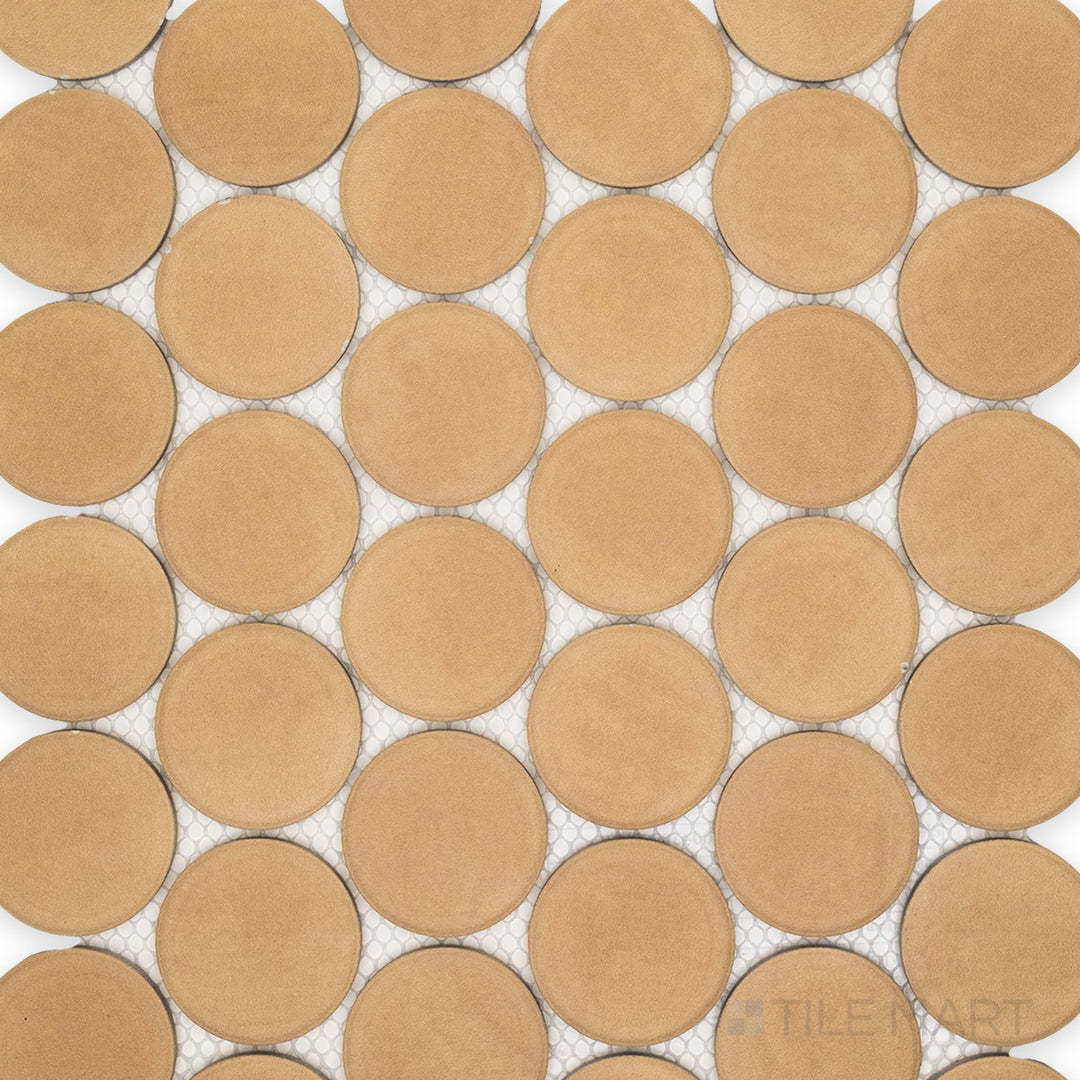 This overview highlights the Amuri Biscotto 2-Inch Round Matte Porcelain Mosaic Tile with its neutral tones, circular layout, and refined matte texture perfect for understated style.