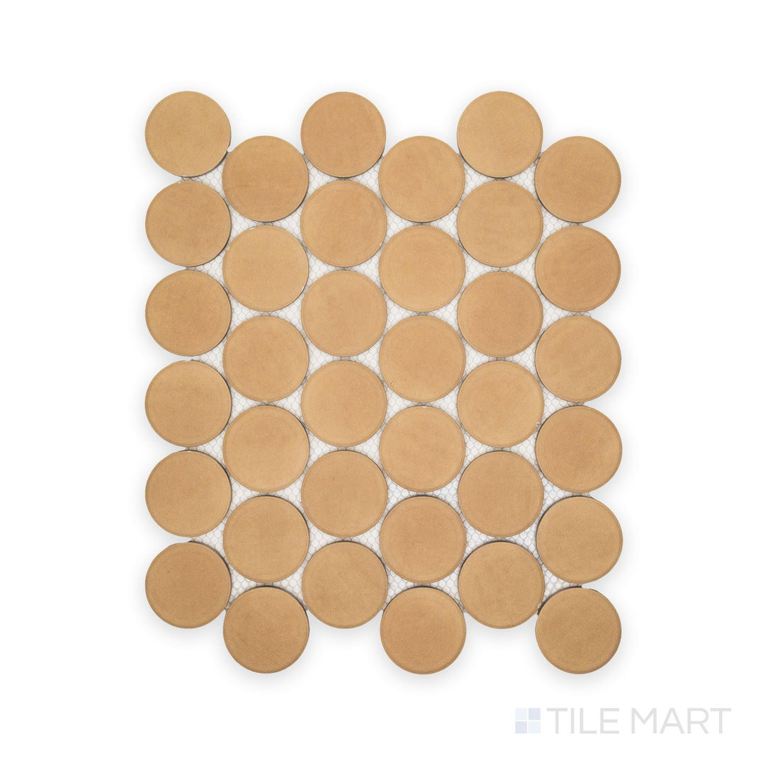 Direct view of Amuri Biscotto 2" Round Matte Porcelain Mosaic Tile showcasing round biscuit-tone chips in a consistent layout with a matte porcelain finish.