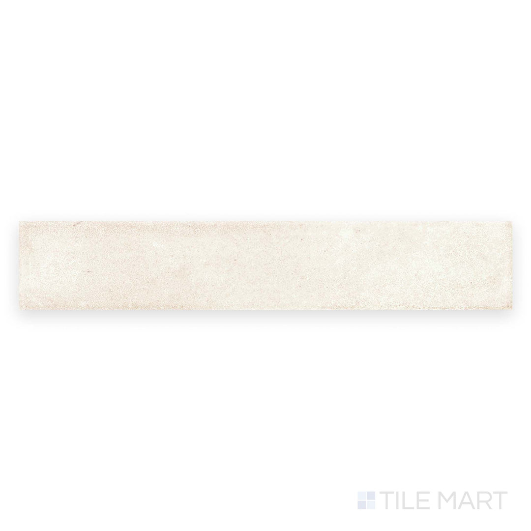 Top view of Amuri Brick Avorio 2x12 Matte Porcelain Tile featuring creamy ivory tones and elongated shape, ideal for walls or backsplashes.