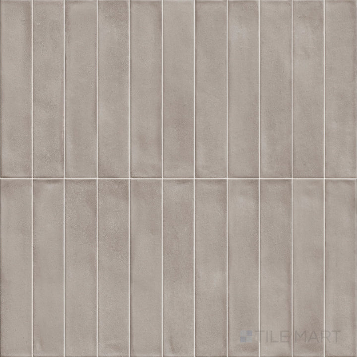 The Amuri Brick Grigio 2x12 Matte Porcelain Tile is presented in an overview capturing its elongated format, contemporary gray tone, and versatile matte finish suitable for walls or accents.