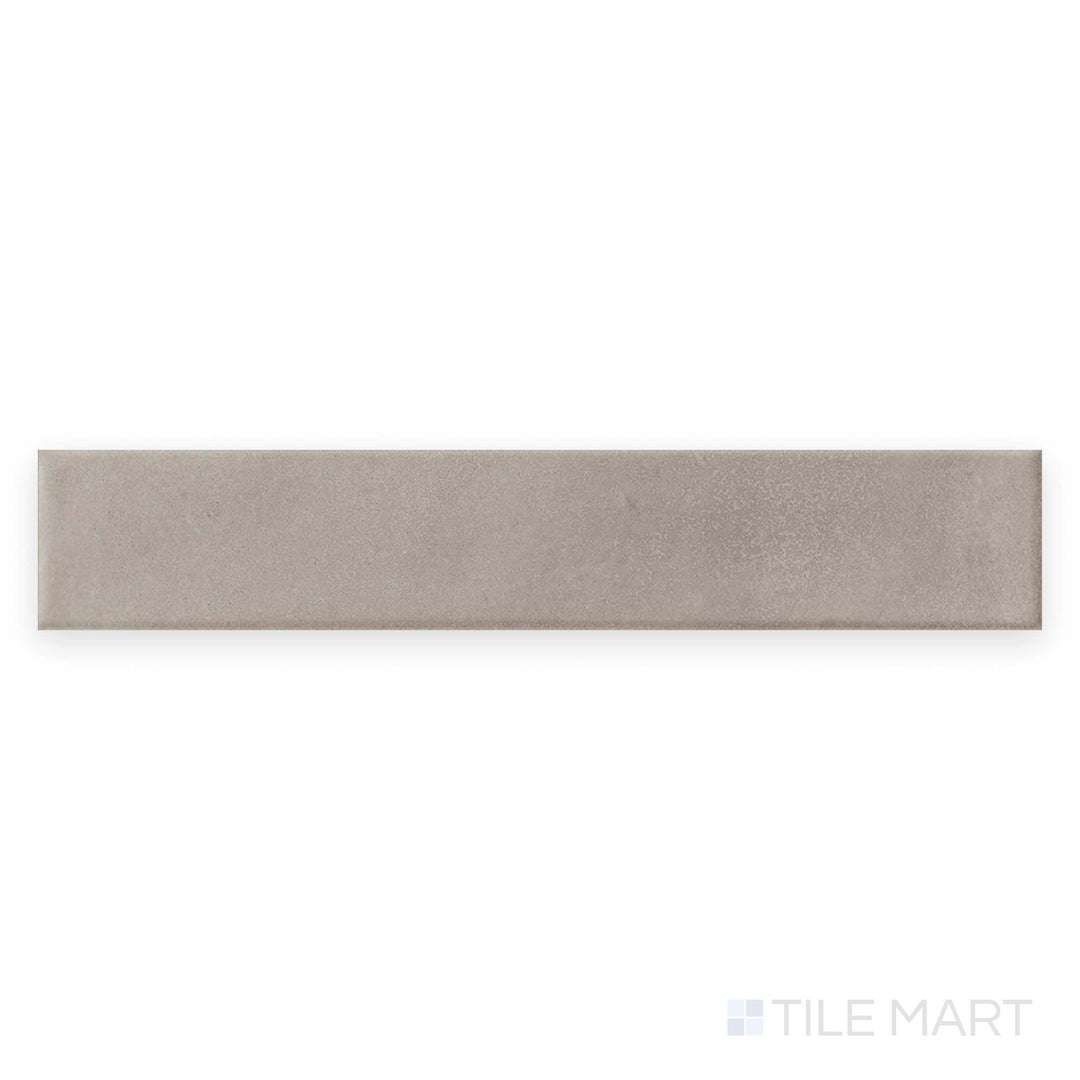 Tile face view of Amuri Brick Grigio 2x12 Matte Porcelain Tile displaying cool gray color and clean lines in a rectangular matte porcelain tile.