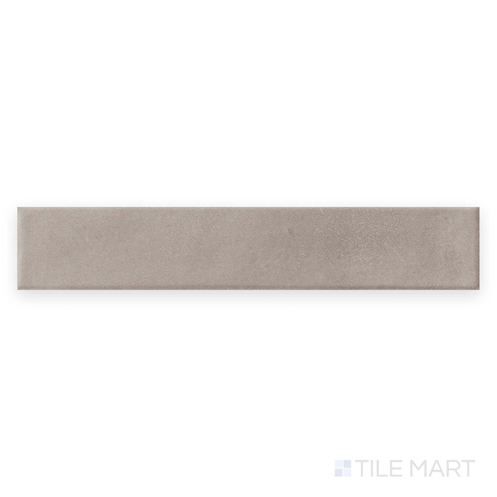 Tile face view of Amuri Brick Grigio 2x12 Matte Porcelain Tile displaying cool gray color and clean lines in a rectangular matte porcelain tile.