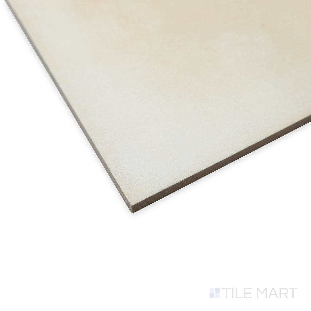 Corner perspective of Amuri Avorio 8x8 porcelain tile highlighting its balanced square shape and soft ivory finish.