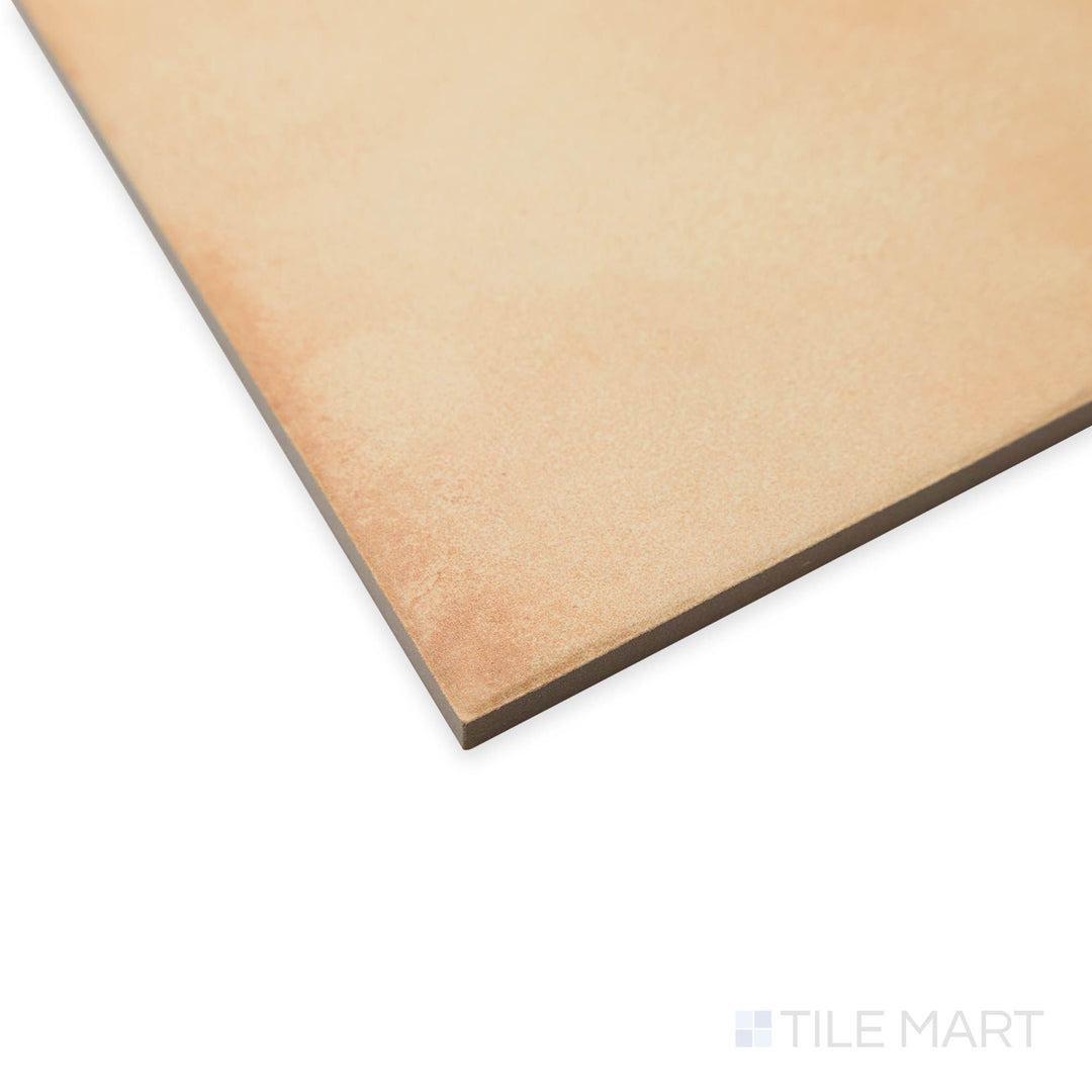 Corner angle of Amuri Biscotto 8x8 porcelain tile showing its warm biscuit tone and smooth matte finish in square format.