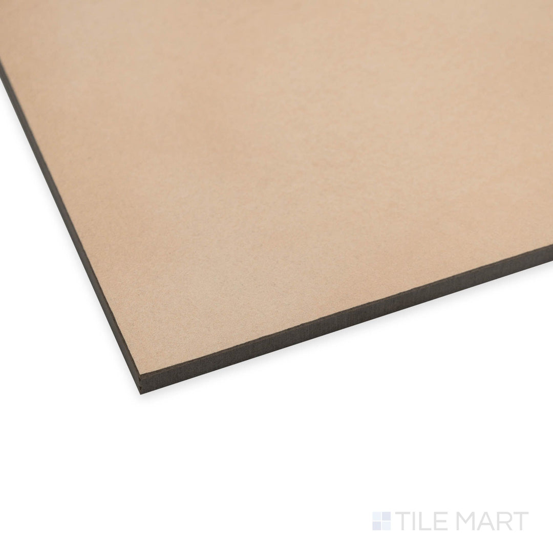 Angled view of Amuri Biscotto 24x24 matte porcelain tile showing its biscuit-toned warmth and clean square shape.