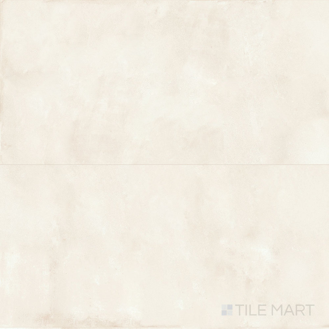 Capturing a broader layout, the Amuri Avorio 24x48 Matte Porcelain Tile is shown with its expansive ivory tone and refined matte finish, perfect for open, airy room backgrounds.