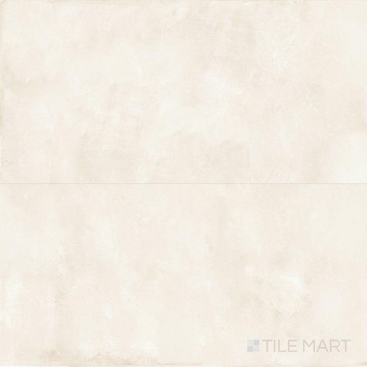 Capturing a broader layout, the Amuri Avorio 24x48 Matte Porcelain Tile is shown with its expansive ivory tone and refined matte finish, perfect for open, airy room backgrounds.