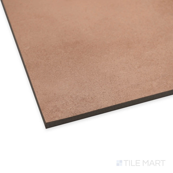 Corner angle of Amuri Cotto 24x48 porcelain tile presenting a rustic terracotta look in a stretched rectangular format.