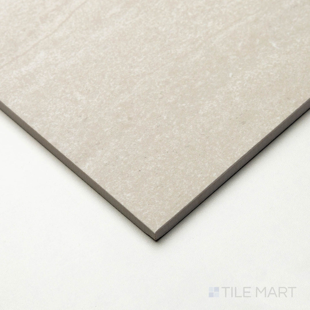 Corner angle of Dorset Vein Cut Bianco 24x48 tile capturing its extended format and light marbled pattern.