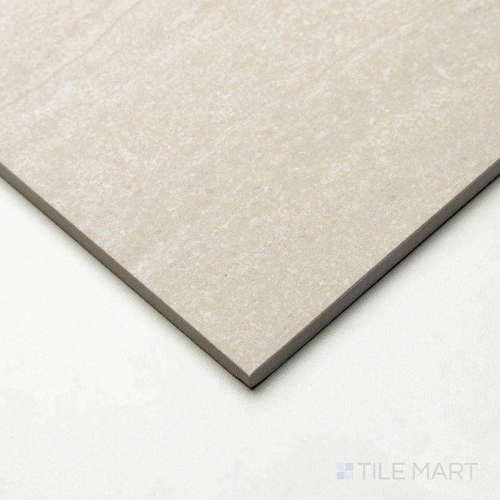 Corner angle of Dorset Vein Cut Bianco 24x48 tile capturing its extended format and light marbled pattern.