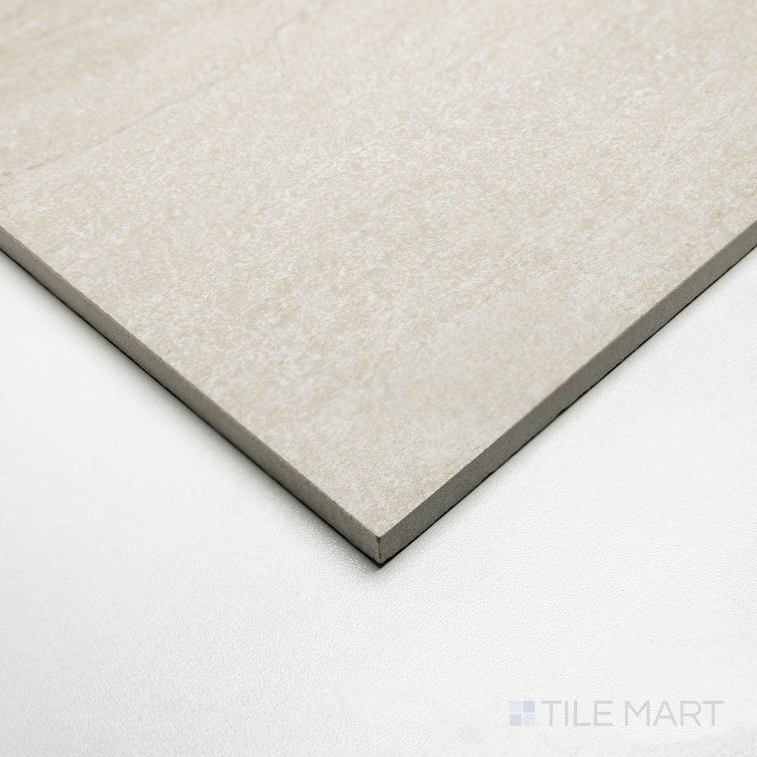 Perspective view of Dorset Vein Cut Beige 24x48 tile displaying soft sandy tones with horizontal veining.