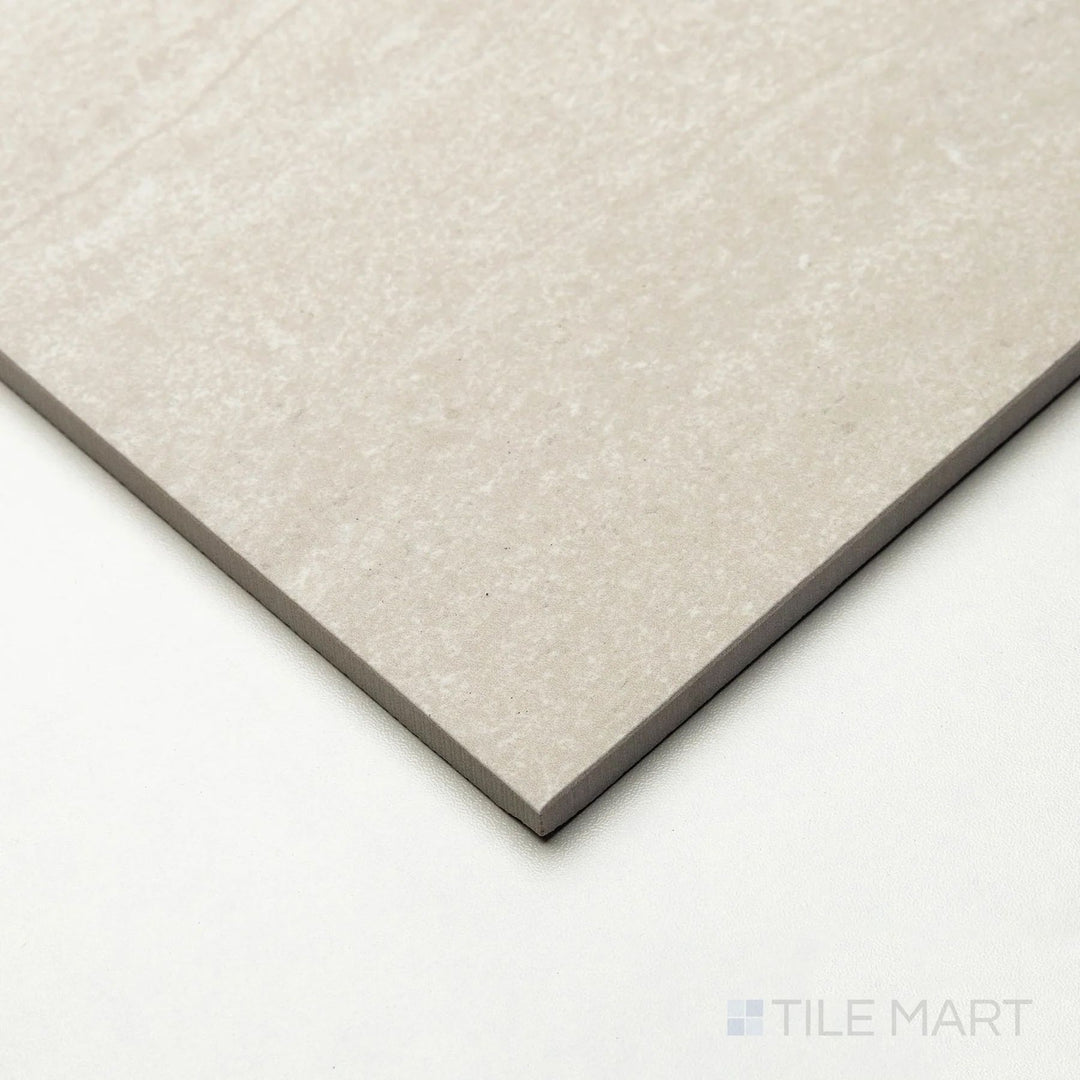 Perspective view of Dorset Cross Cut Bianco 48x48 tile emphasizing intricate cross-cut veining on a light base.