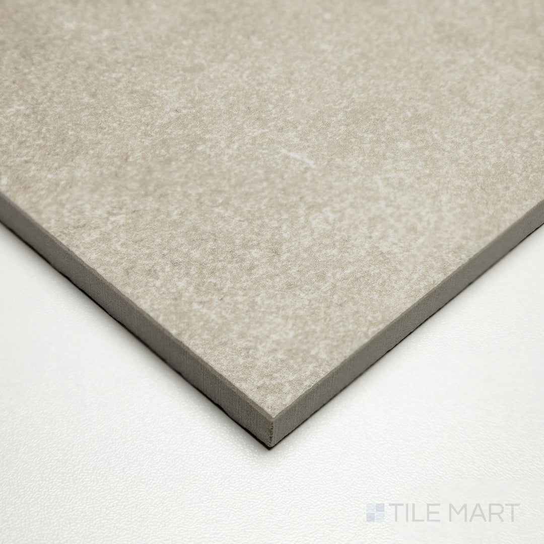 Corner shot of Dorset Cross Cut Beige 24x24 tile showing neutral tones and delicate cross-cut patterns in a refined finish.