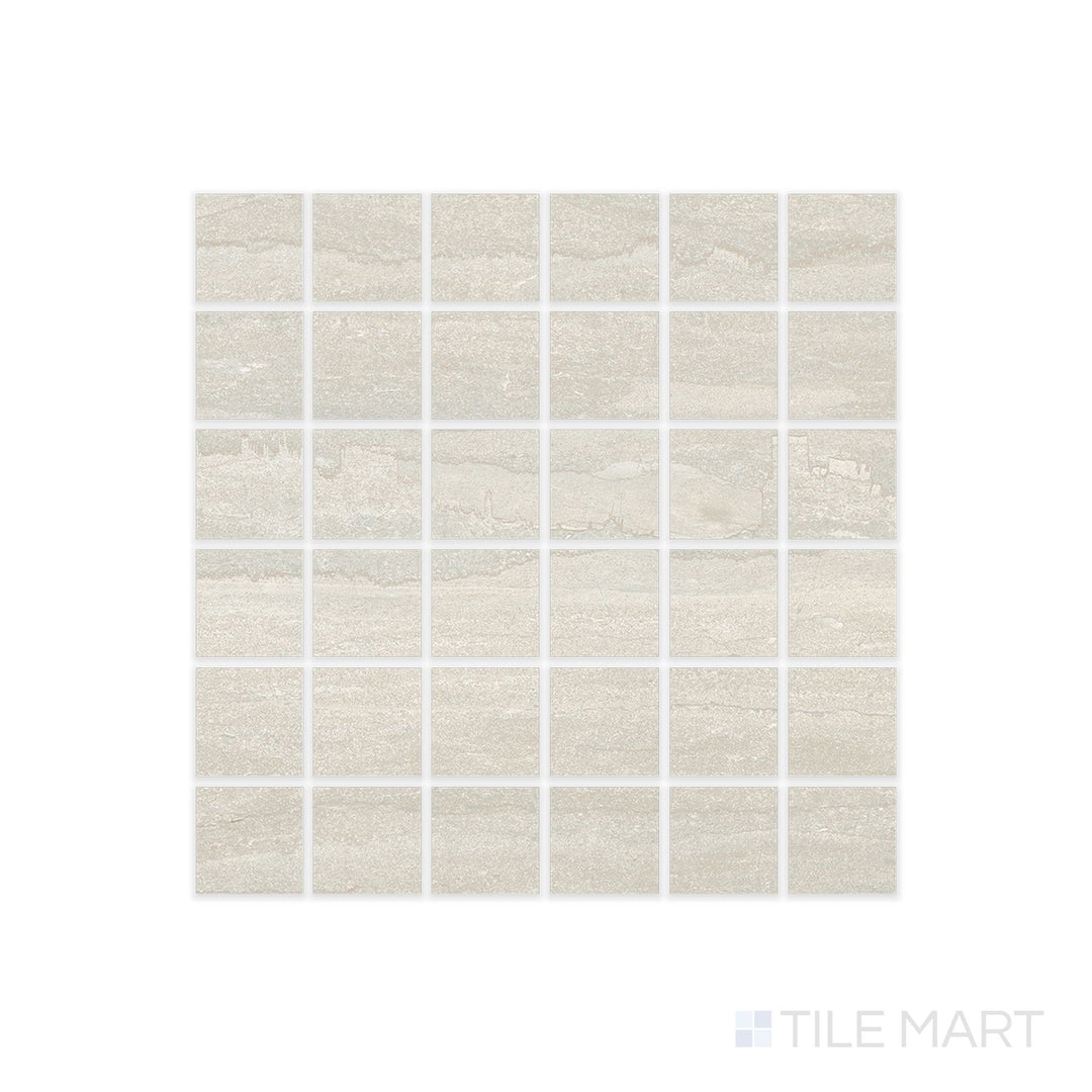 Top-down look at Dorset Cross Cut Bianco 2" Square Matte Porcelain Mosaic displaying small white mosaic pieces with soft stone texture and matte glaze.