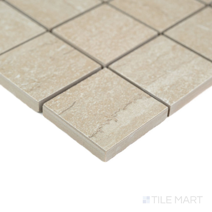 Corner detail of Dorset Cross Cut Beige 2" Square Matte Porcelain Mosaic highlighting its neutral beige palette and small format design – great for shower floors and decorative accents.