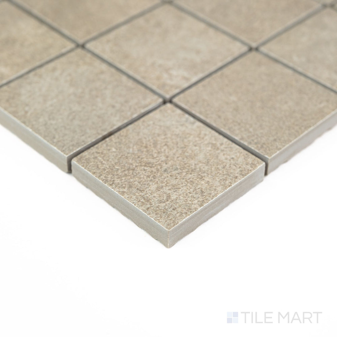 Corner view of Dorset Cross Cut Tortora 2" Square Matte Porcelain Mosaic tile, showcasing warm tones and cross-cut texture – perfect for backsplashes and small-scale features.