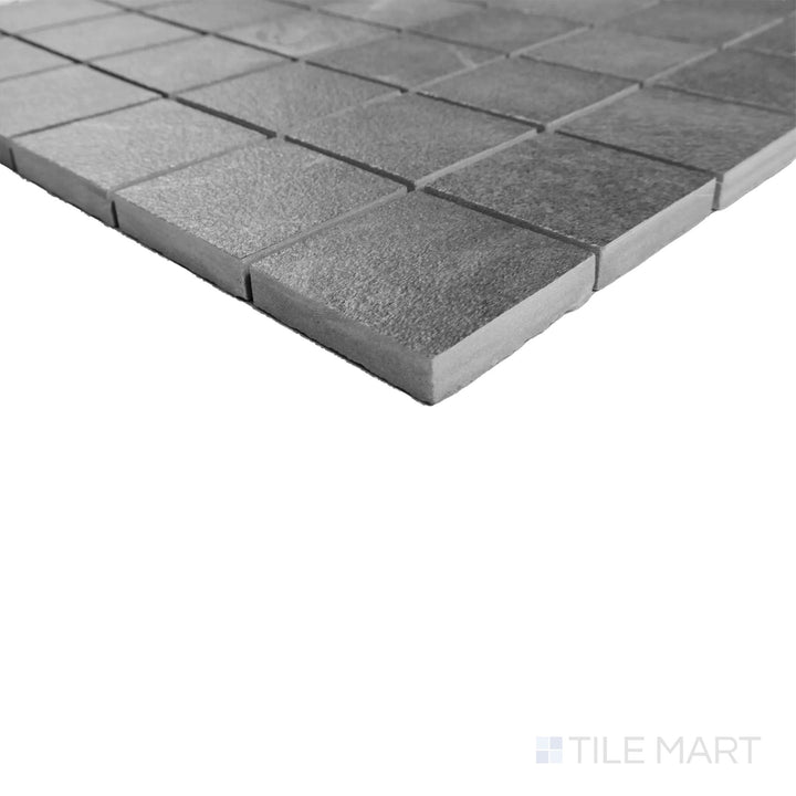 Detailed corner angle of Hurricane Smoke 2" square mosaic showcasing deep gray squares in a contemporary matte finish.