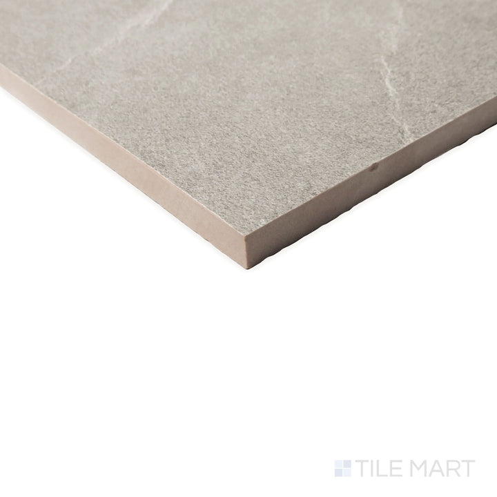 Side view of Hurricane Silver 48x48 tile capturing the cool metallic undertones and subtle stone-like texture.