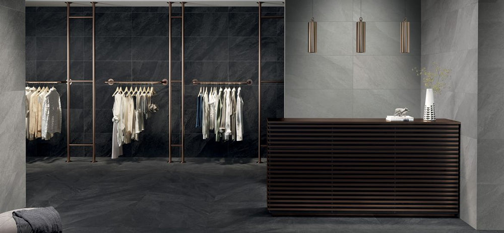 Open, modern design with Hurricane Smoke 48x48 Matte Porcelain Tile in a bold charcoal shade that adds contrast and sophistication.