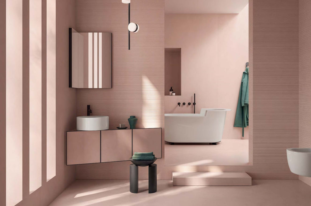Room styled with Nuances Rose 24x48 Matte Porcelain Tile, featuring a soft blush hue and a smooth matte finish for a warm, modern aesthetic.