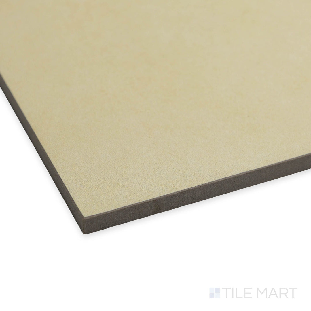 Angled view of Nuances Luce 24x48 tile showing off its bright neutral palette and sleek matte surface.
