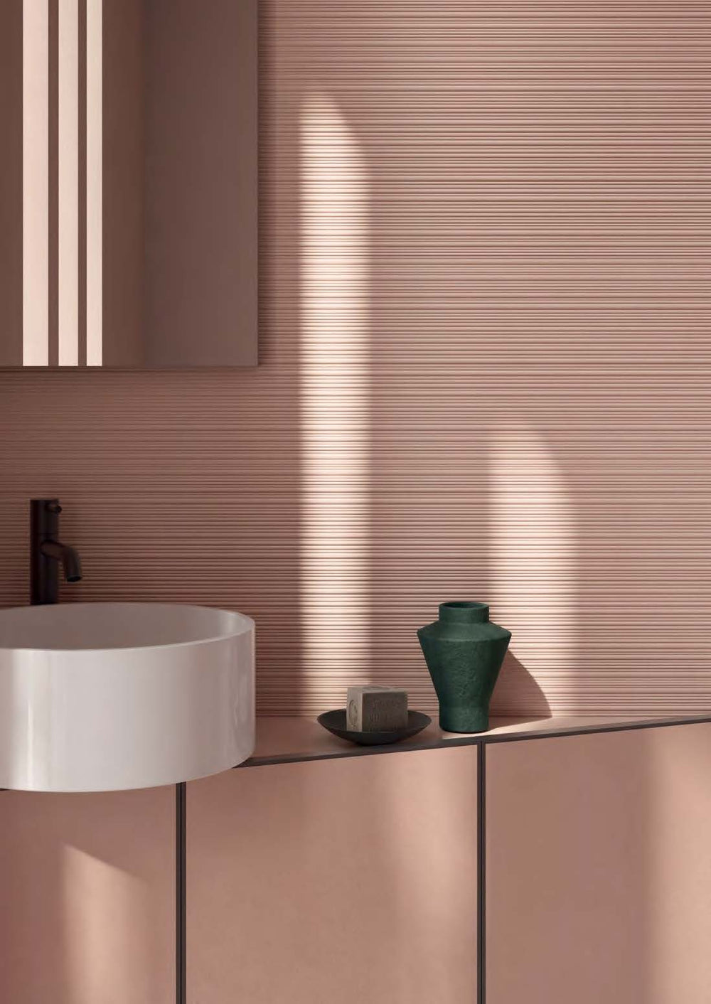 Scene showcasing Nuances Ribbed Rose 24x48 Matte Porcelain Tile with its soft pink tone and subtle ribbed texture that adds depth and visual interest.