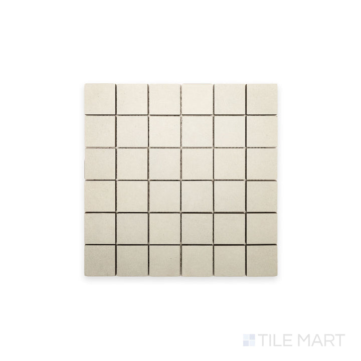 Tile detail view of Nuances Bianco 2" Square Matte Porcelain Mosaic, revealing uniform white mosaic squares perfect for shower floors or backsplashes.