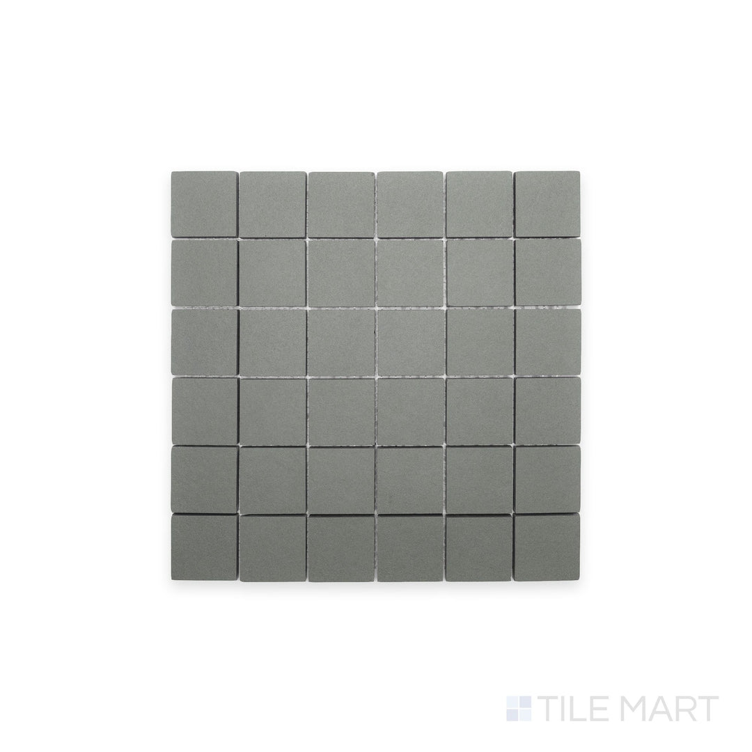 Top-view capture of Nuances Salvia 2" Square Matte Porcelain Mosaic, offering botanical green tones in a compact mosaic ideal for eco-inspired design accents.