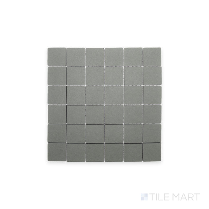 Top-view capture of Nuances Salvia 2" Square Matte Porcelain Mosaic, offering botanical green tones in a compact mosaic ideal for eco-inspired design accents.
