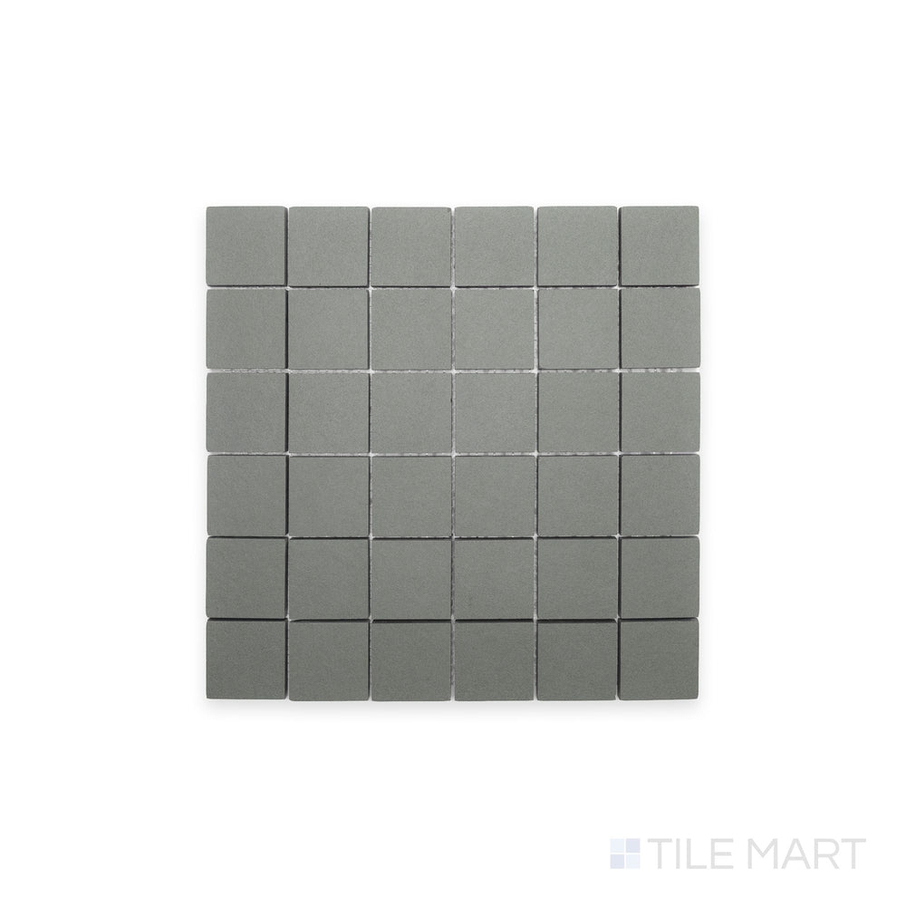 Top-view capture of Nuances Salvia 2" Square Matte Porcelain Mosaic, offering botanical green tones in a compact mosaic ideal for eco-inspired design accents.