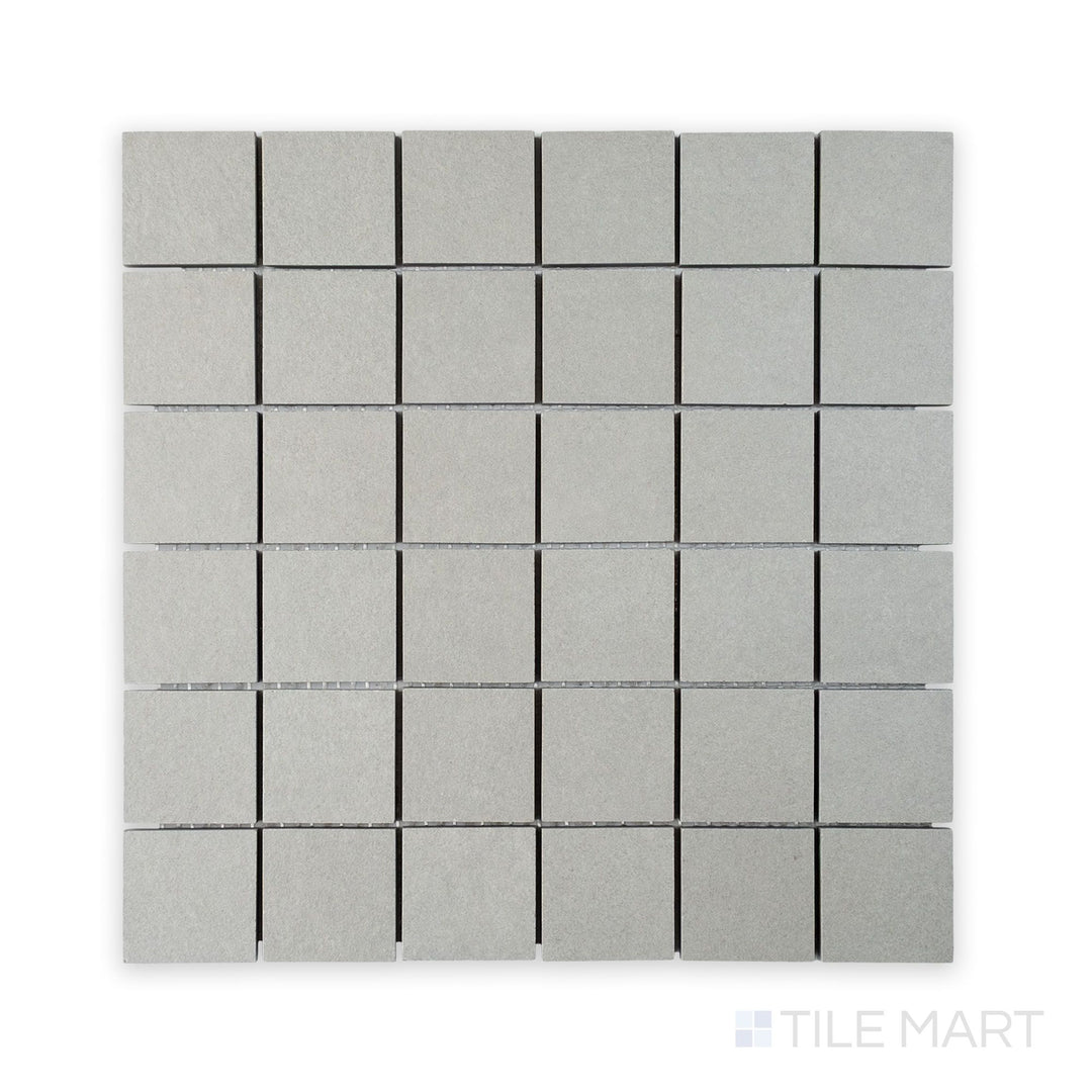 Aerial perspective of Nuances Grigio 2" Square Matte Porcelain Mosaic, with cool gray tones providing a versatile neutral base for creative tiling patterns.