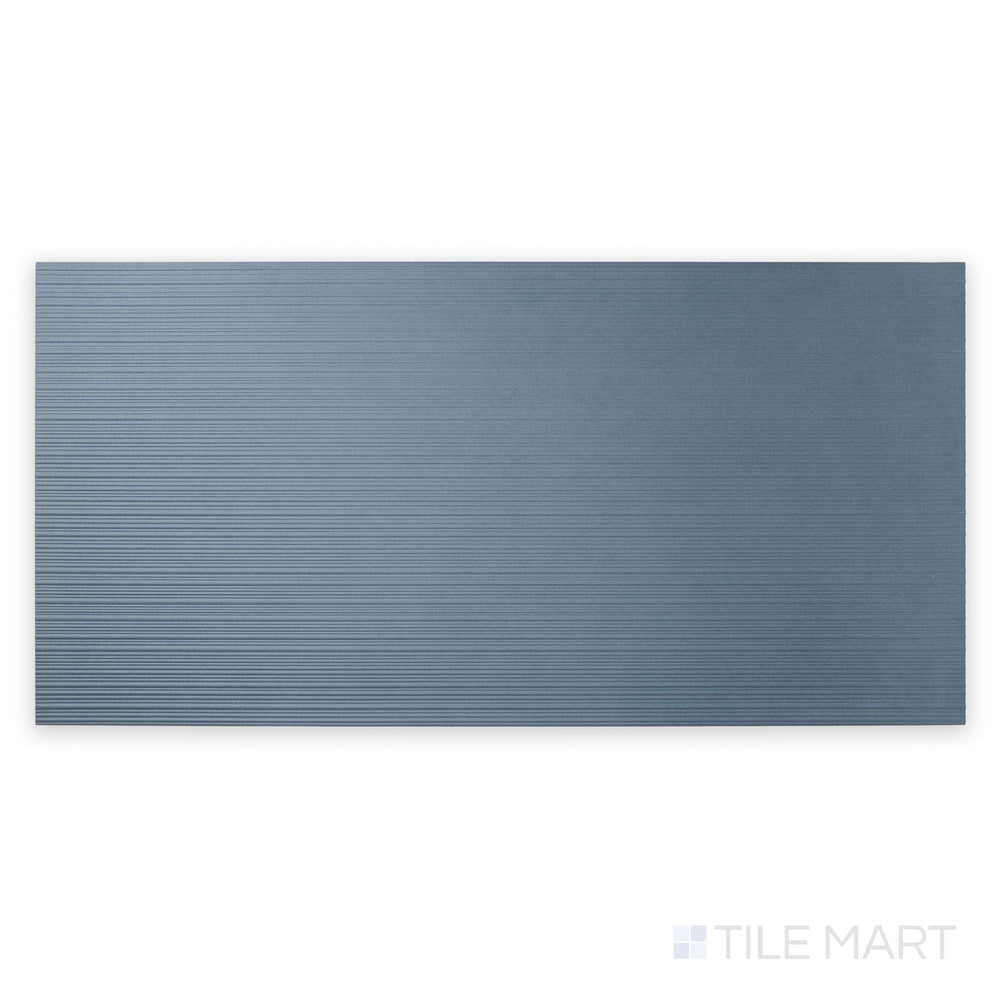 Bird’s-eye view of Nuances Ribbed Cielo 24x48 Matte Porcelain, emphasizing textural grooves and soft blue hues for visually engaging vertical spaces.