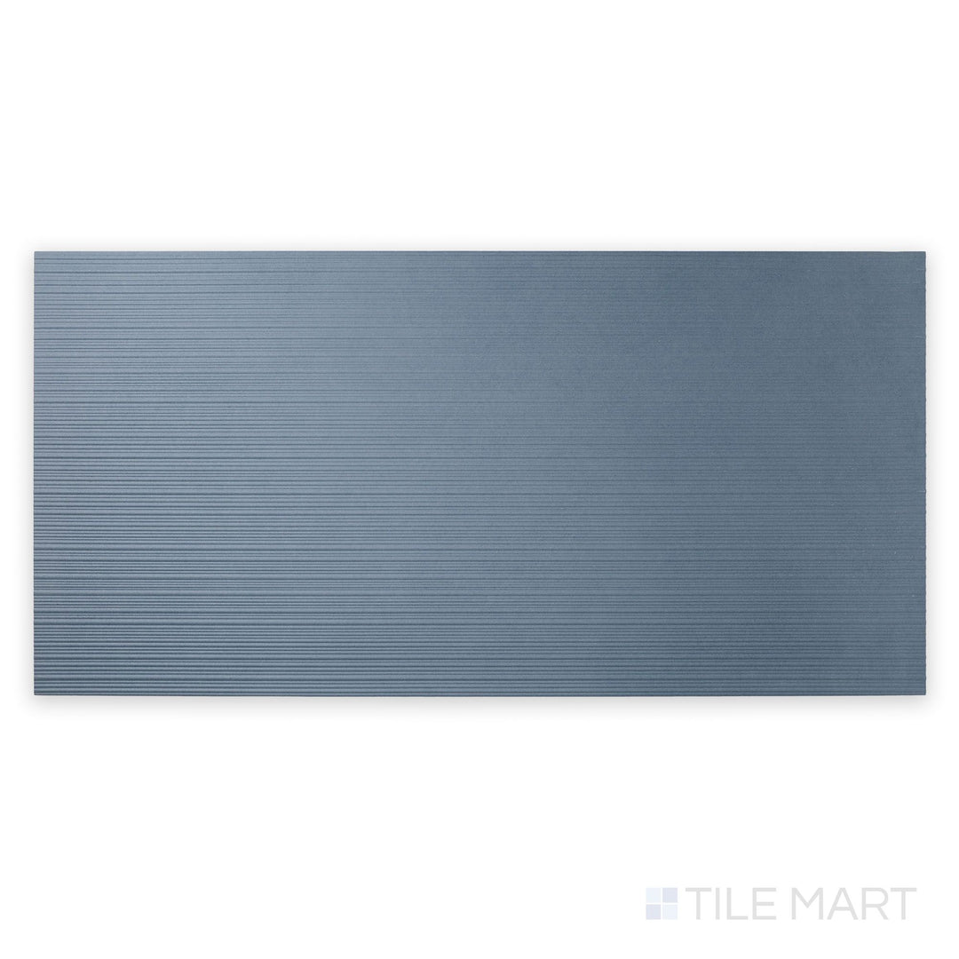 Bird’s-eye view of Nuances Ribbed Cielo 24x48 Matte Porcelain, emphasizing textural grooves and soft blue hues for visually engaging vertical spaces.