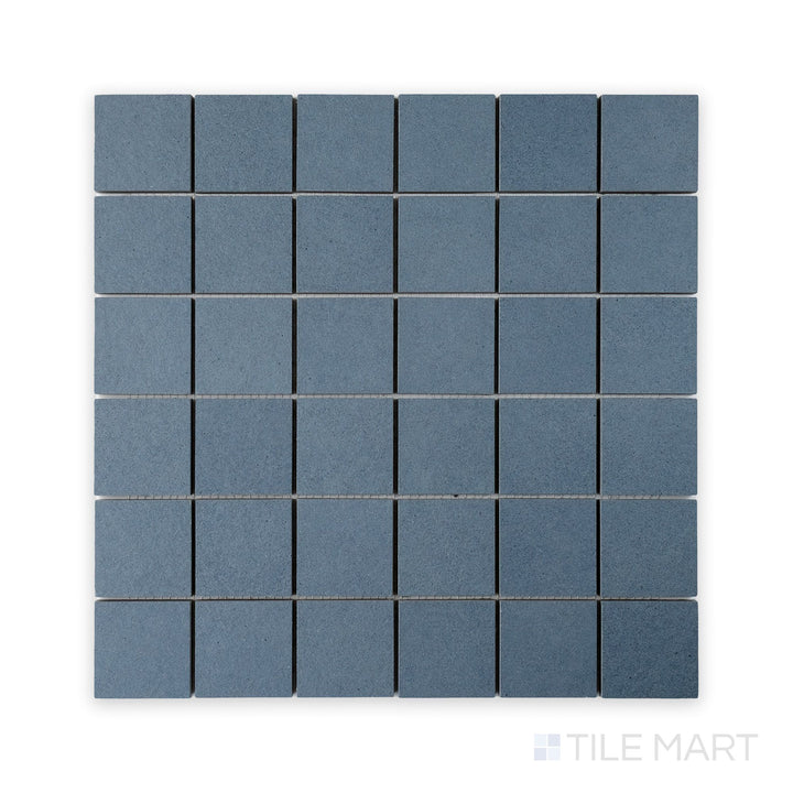 Straight-on mosaic shot of Nuances Cielo 2" Square Matte Porcelain Mosaic, showing gentle blue square segments designed for accent walls or feature zones.