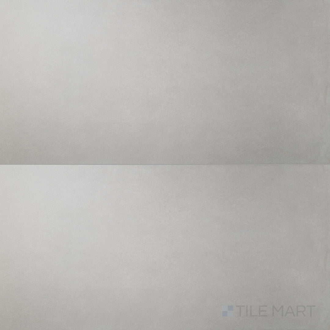 Surface view of Nuances Grigio 24x48 Matte Porcelain Tile featuring cool gray tone, smooth stone-look finish, and minimalist matte surface for clean, modern designs.