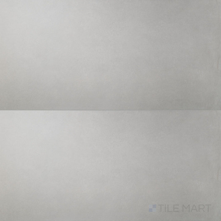 Surface view of Nuances Grigio 24x48 Matte Porcelain Tile featuring cool gray tone, smooth stone-look finish, and minimalist matte surface for clean, modern designs.