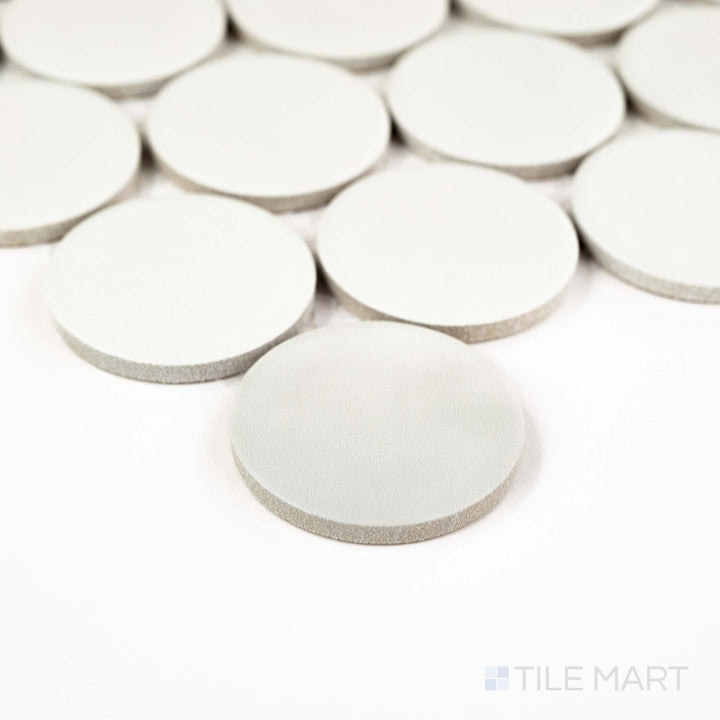 Corner shot of Passaggi White 2" Round Matte Porcelain Mosaic featuring soft white penny rounds with a smooth matte finish – ideal for vintage or contemporary accents.