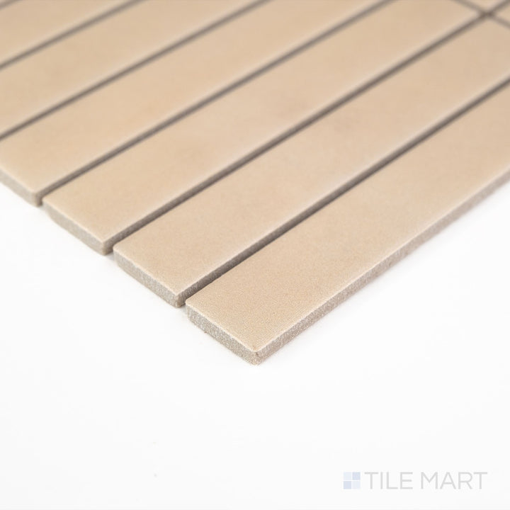 Corner detail of Passaggi Beige 1x6 Grid Matte Porcelain Mosaic highlighting warm beige tones and linear design – great for subtle yet stylish wall applications.