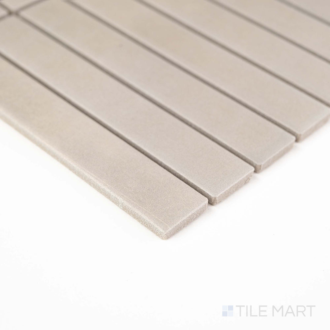 Corner view of Passaggi Grey 1x6 Grid Matte Porcelain Mosaic featuring cool gray tones and a modern stacked layout – ideal for clean, minimalist design schemes.