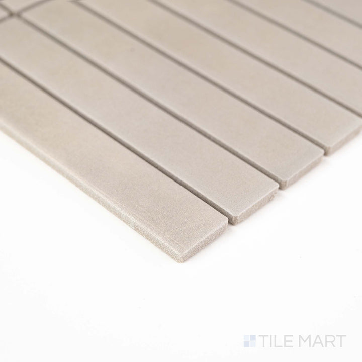 Corner view of Passaggi Grey 1x6 Grid Matte Porcelain Mosaic featuring cool gray tones and a modern stacked layout – ideal for clean, minimalist design schemes.