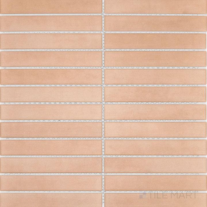 Surface view of Passaggi Blush 1x6 Grid Matte Porcelain Mosaic Tile showcasing pale rose-toned rectangles in a stylish grid pattern with matte surface.