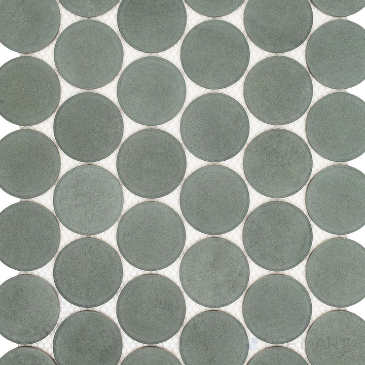 Product overview of Passaggi Green 2" Round Matte Porcelain Mosaic Tile with soft sage-green shade, circular layout, and a clean matte surface.
