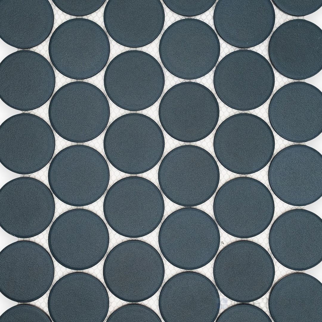 Overview of Passaggi Blue 2" Round Matte Porcelain Mosaic Tile highlighting cool blue tones, round matte porcelain chips, and a soft, calming appearance.