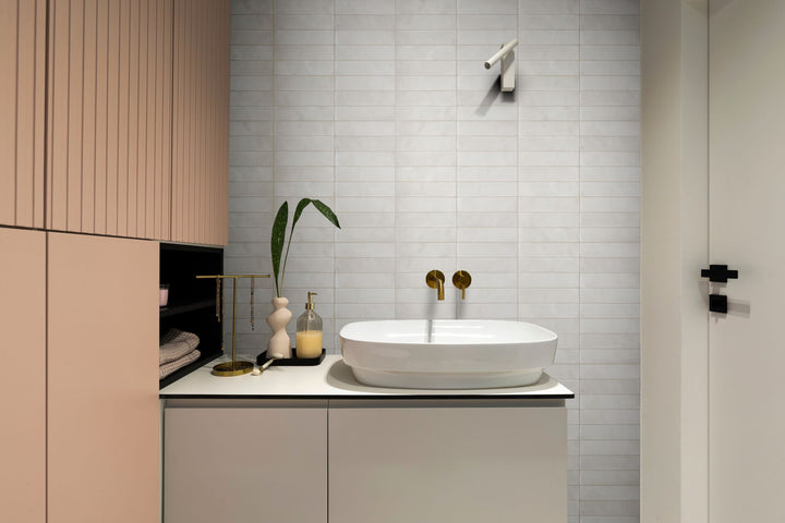 Room featuring Passaggi White 2x9 Matte Porcelain Tile, offering a clean, minimalist look with its crisp white hue and sleek rectangular format.