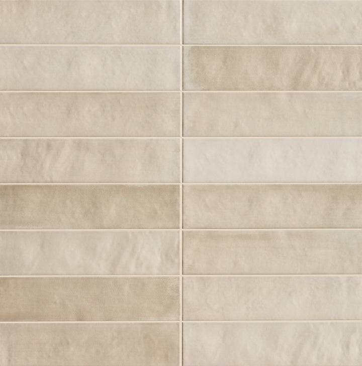 Product overview of Passaggi Beige 2x9 Matte Porcelain Tile featuring soft beige color, elongated shape, and smooth matte surface for warm, neutral design palettes.